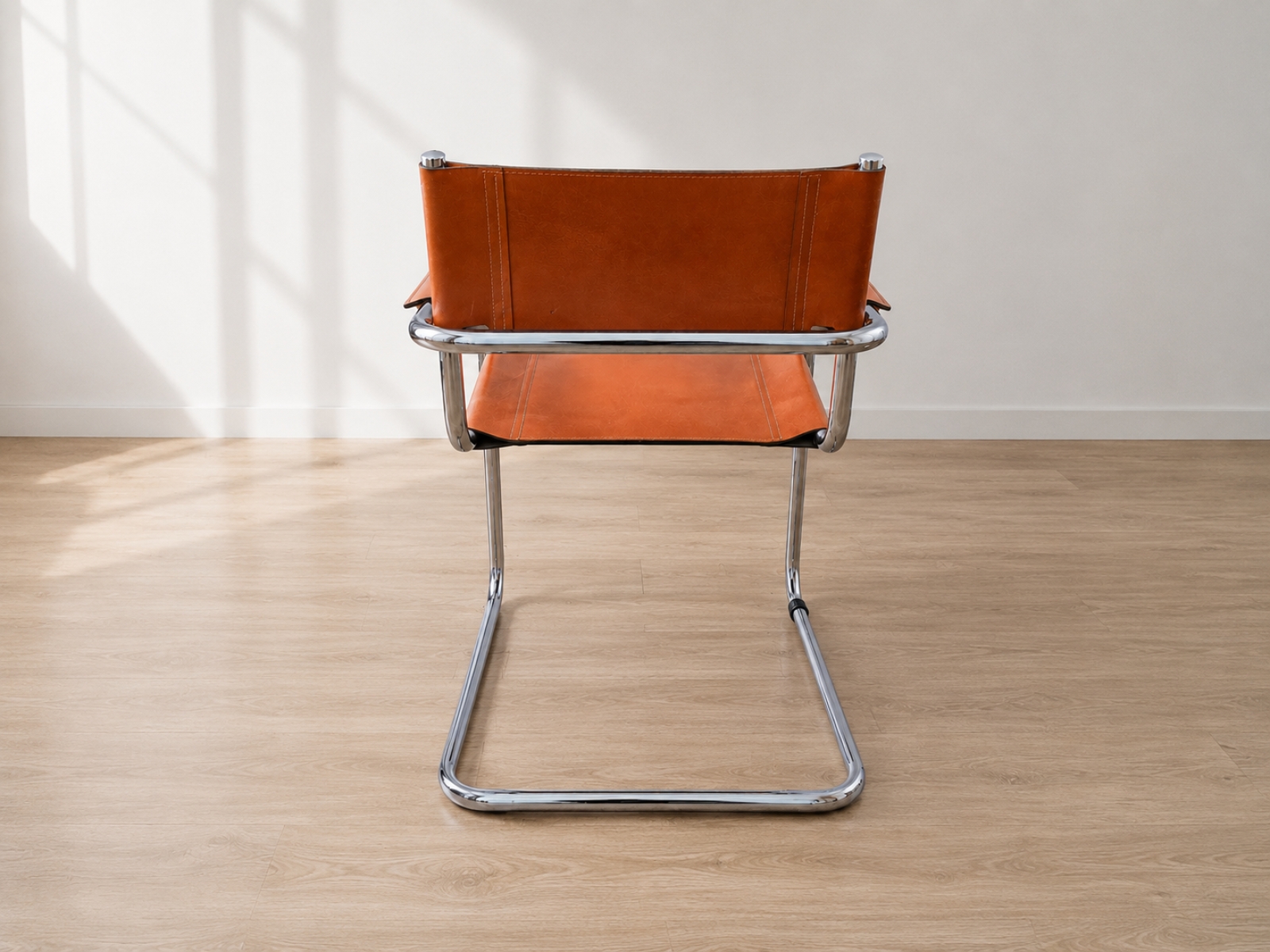 Sedia design cantilever cuoio e acciaio cromato 3
