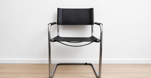 Set sedie design cantilever in acciaio cromato e cuoio nero