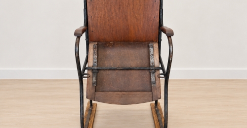 Sedia vintage legno e metallo con sedile ribaltabile a molla