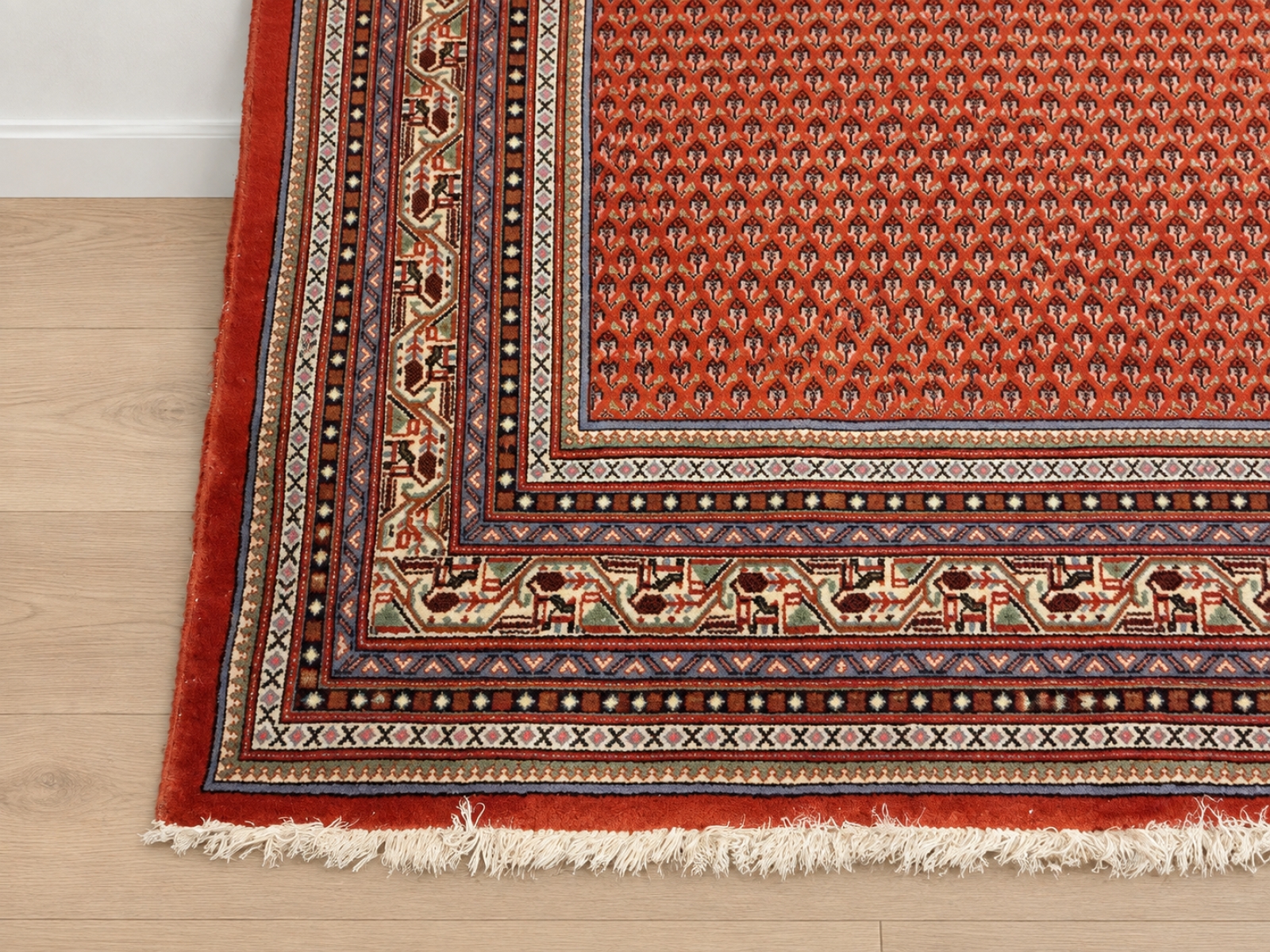 Tappeto decorativo rosso con motivi geometrici 4