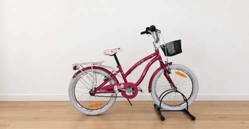 Bicicletta rosa con cestino e portapacchi (Nr. 49)