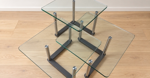 Set di 3 tavolini in vetro e acciaio